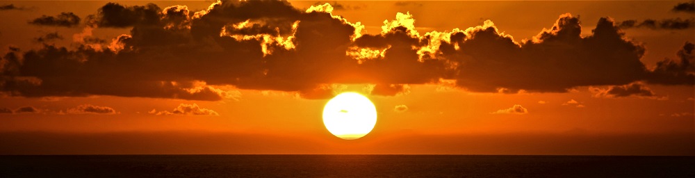 Sun Photo A00005 Sunset Over the Ocean